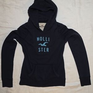 Hollister Women's Navy Hoodie with Teal Logo